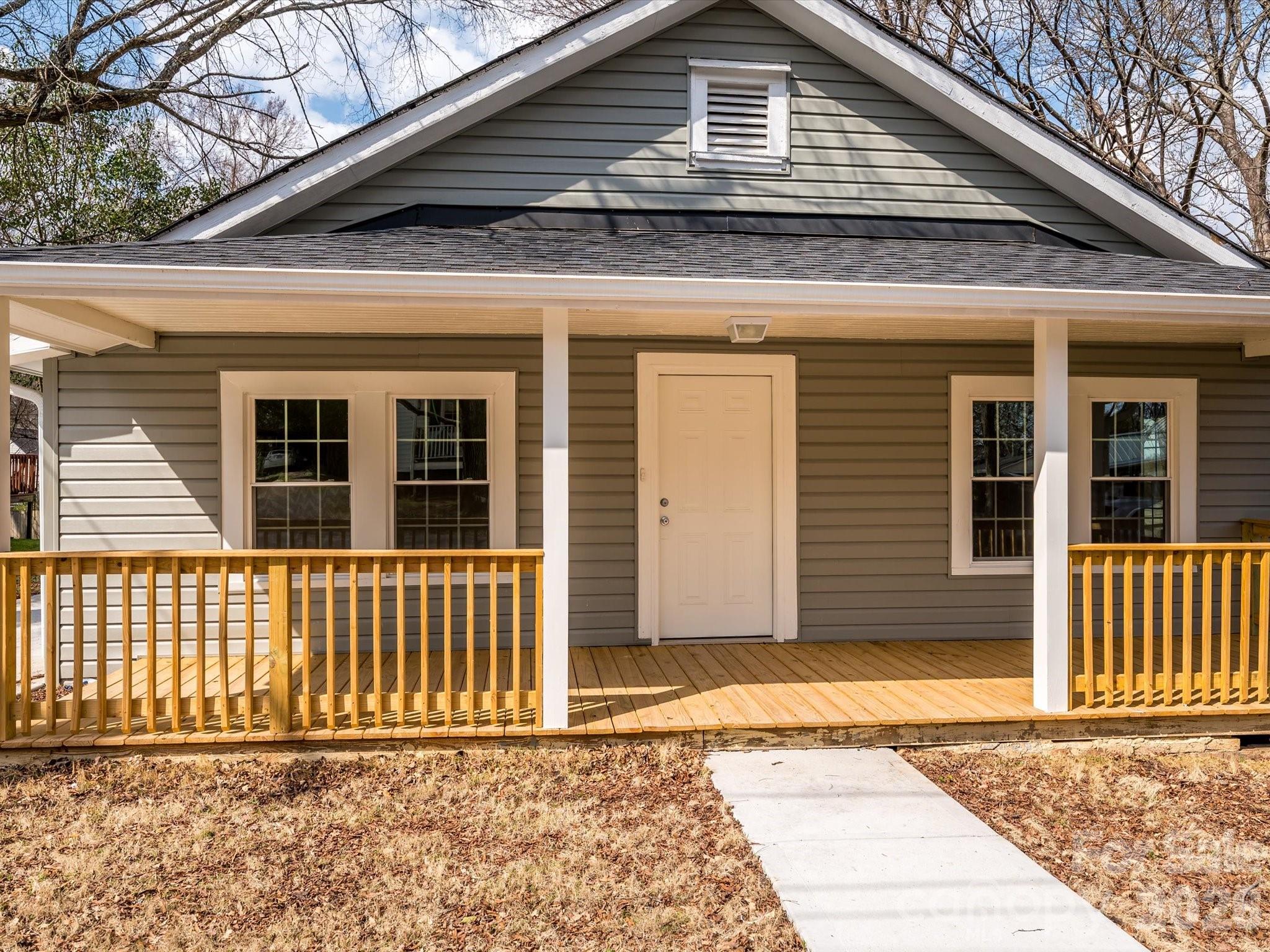 156 Hartsell School Road Southwest Concord, NC 28027 - Photo 2 of 28 a front view of a house