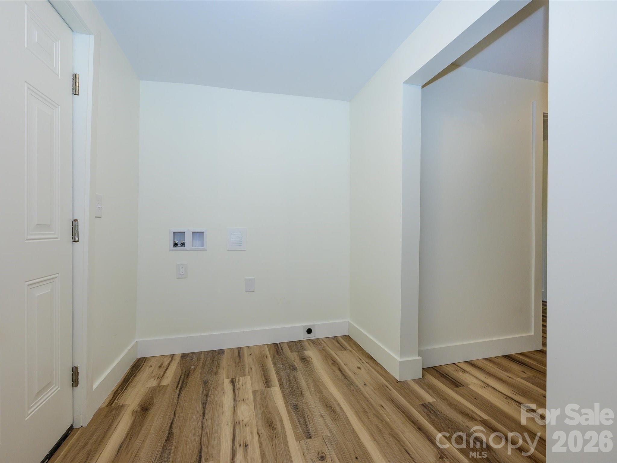 156 Hartsell School Road Southwest Concord, NC 28027 - Photo 24 of 28 a view of a room with wooden floor and small space