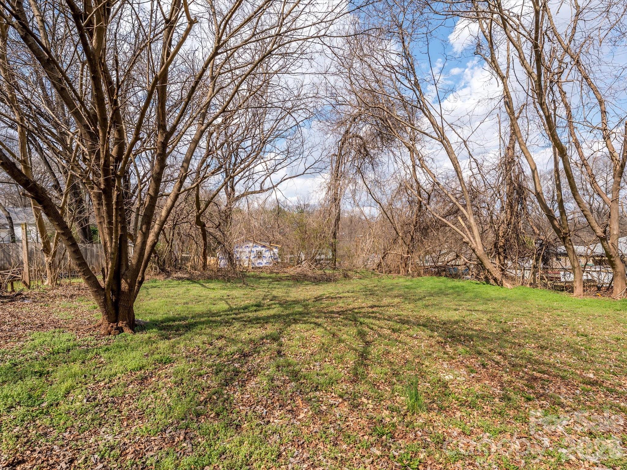 156 Hartsell School Road Southwest Concord, NC 28027 - Photo 27 of 28 a view of a yard with large trees