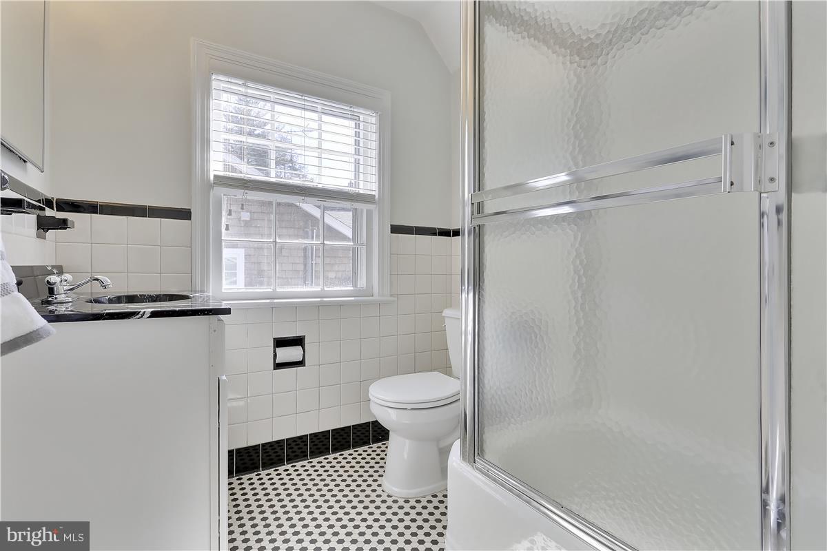 1600 Grace Church Road Silver Spring, MD 20910 - Photo 16 of 29 Upper Hall Bath with vintage blk/white tile