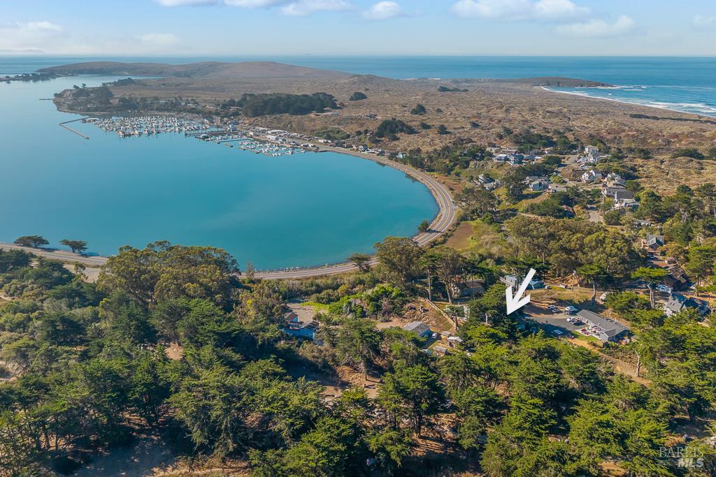 1677 Bay Flat Road Bodega Bay, CA 94923 - Photo 1 of 1 an aerial view of ocean with residential house with outdoor space