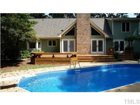 8521 Kempton Road Raleigh, NC 27615 - Photo 18 of 25 Living outside, swimming in the low maintenance salt water pool with diving board. Does it get any better than this? Swimming Pool/Hot Tub/Sauna