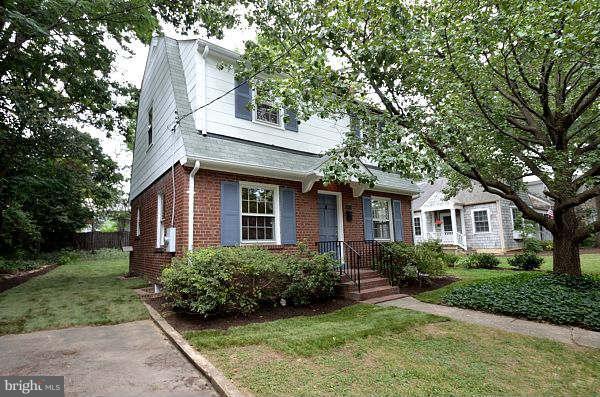 2423 Ridge Rd Drive Alexandria, VA 22302 - Photo 2 of 19 a front view of a house with a yard