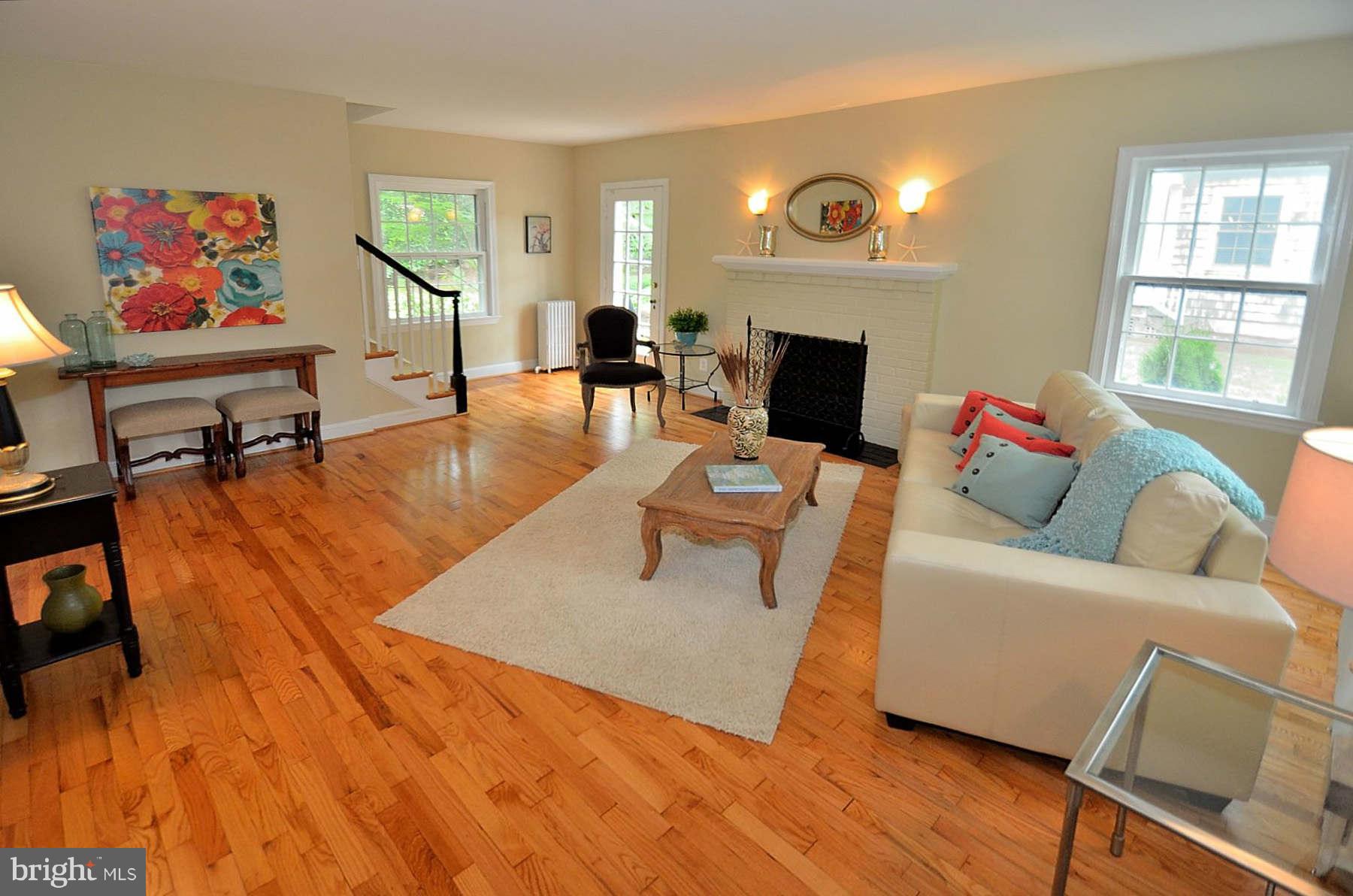 2423 Ridge Rd Drive Alexandria, VA 22302 - Photo 3 of 19 a living room with furniture and a fireplace