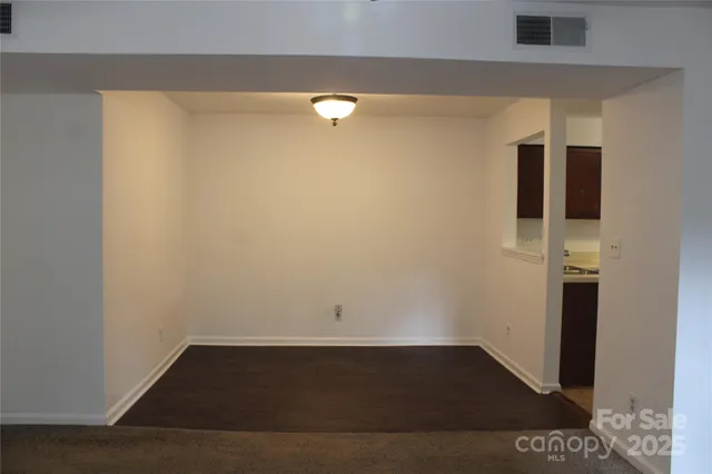 a stove top oven sitting inside of a kitchen