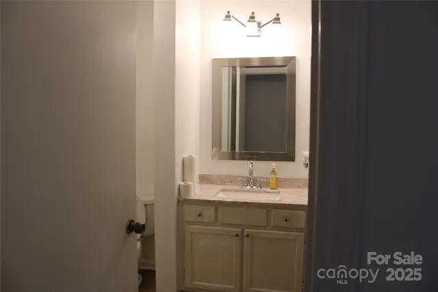 a bathroom with a sink and toilet