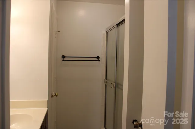 a view of balcony with wooden floor