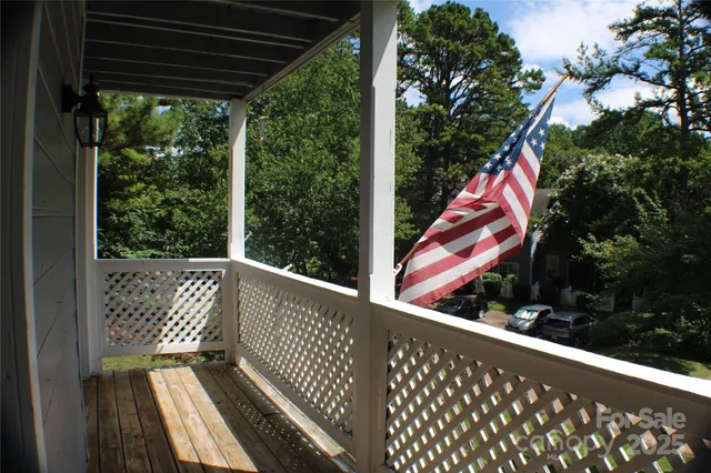 a view of balcony and yard