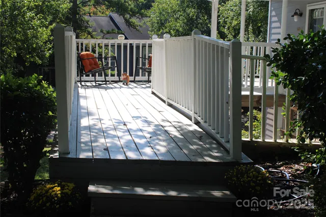 a view of balcony with furniture