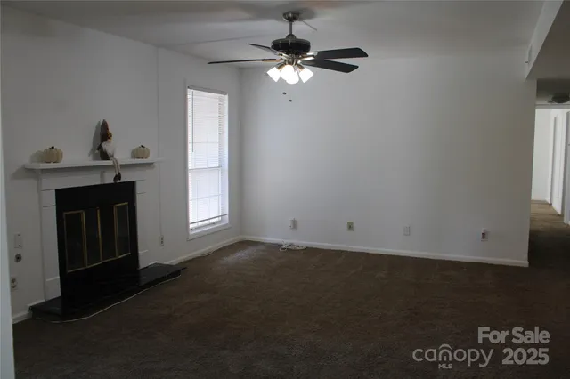 a view of balcony with wooden floor and outdoor seating