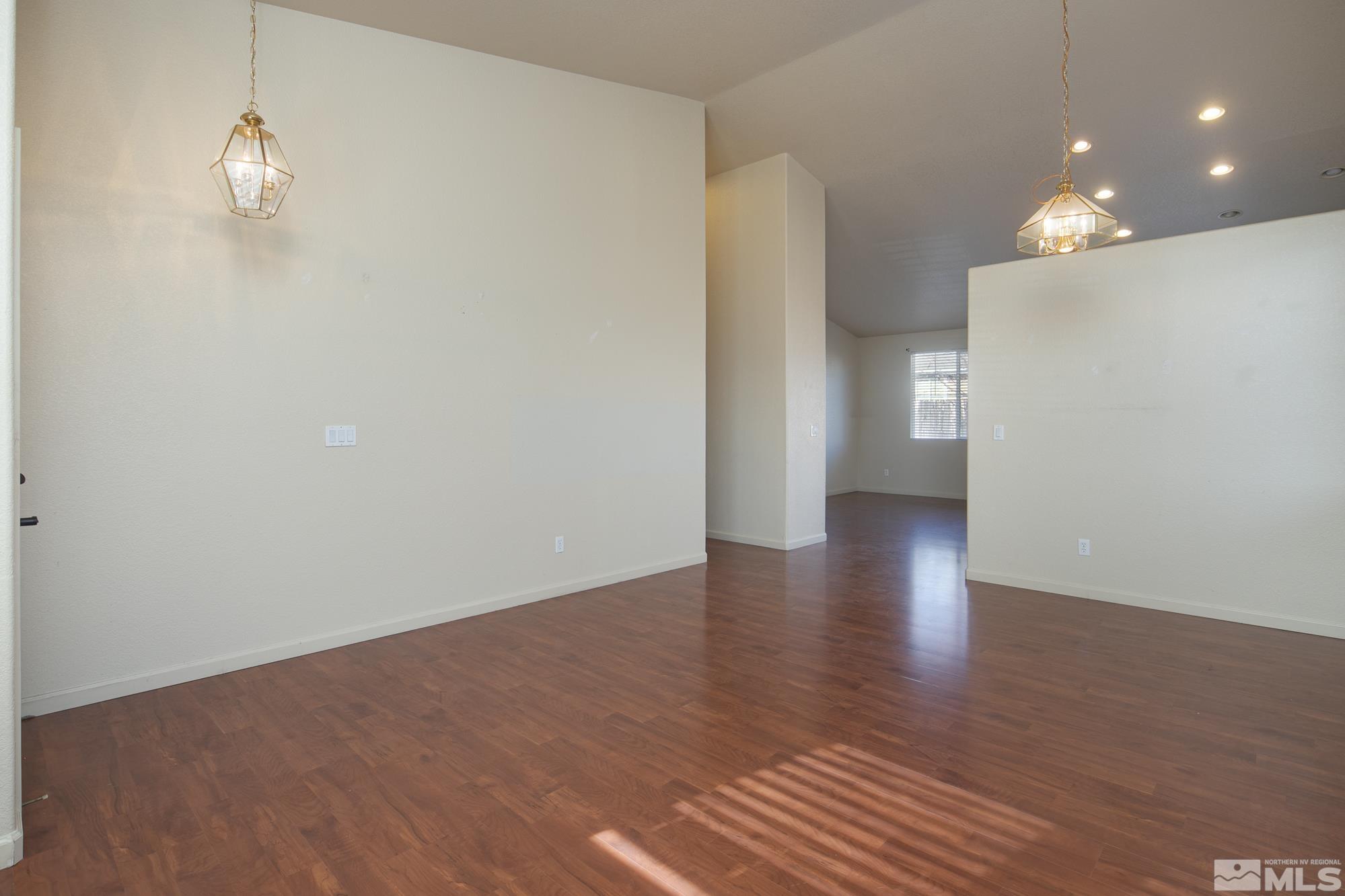 8987 Sorcha Street Reno, NV 89506 - Photo 12 of 29 a view of a livingroom with wooden floor