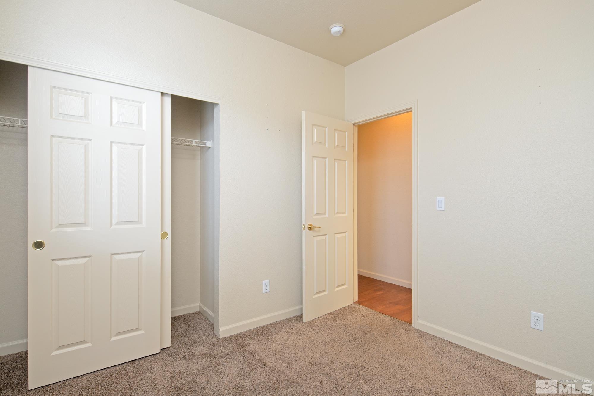 8987 Sorcha Street Reno, NV 89506 - Photo 17 of 29 an empty room with closet area
