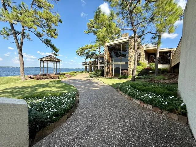 a view of a swimming pool with an outdoor space and seating area