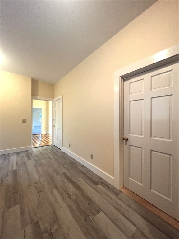 12 Myrtle Street, Unit 2 Middleboro, MA 02346 - Photo 5 of 14 a view of empty room with wooden floor