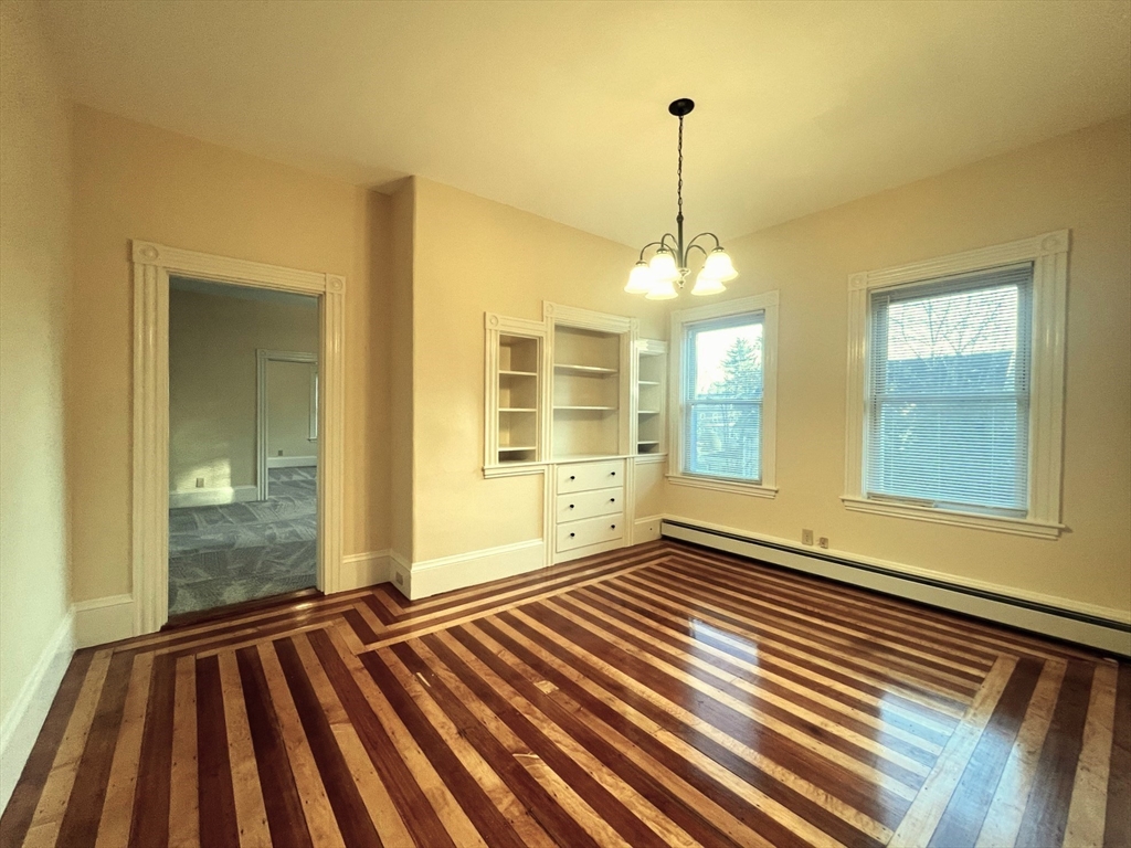 12 Myrtle Street, Unit 2 Middleboro, MA 02346 - Photo 6 of 14 a view of a room with wooden floor and windows