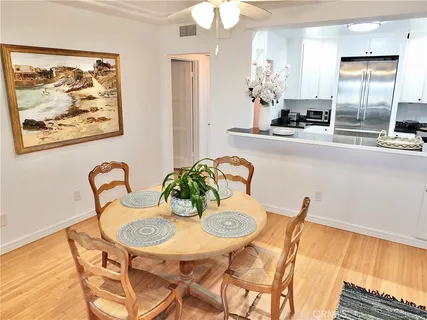 a kitchen with granite countertop a stove and a sink