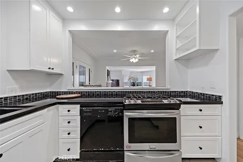 a spacious bathroom with a double vanity sink mirror and a
