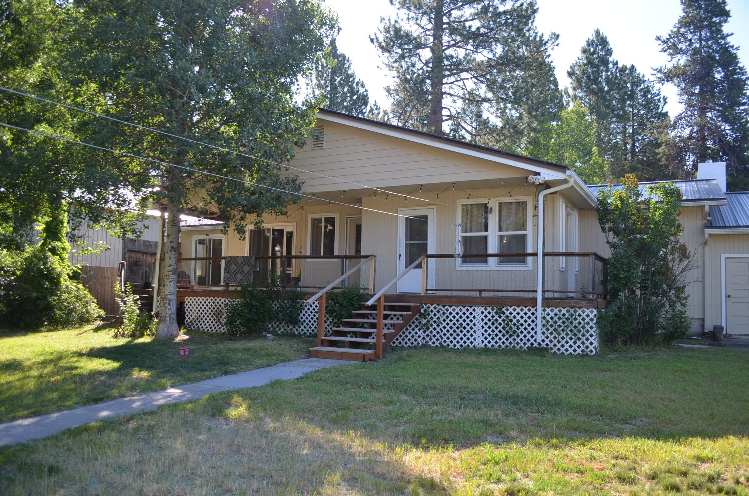 137008 Main Street Crescent, OR 97733 - Photo 40 of 50 a view of a house with a yard patio and fire pit