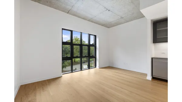 a picture of a room with a bench