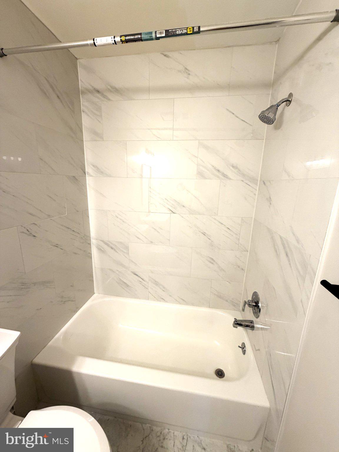 53 Sandra Road Voorhees, NJ 08043 - Photo 5 of 27 Sleek marble bath retreat awaits you.