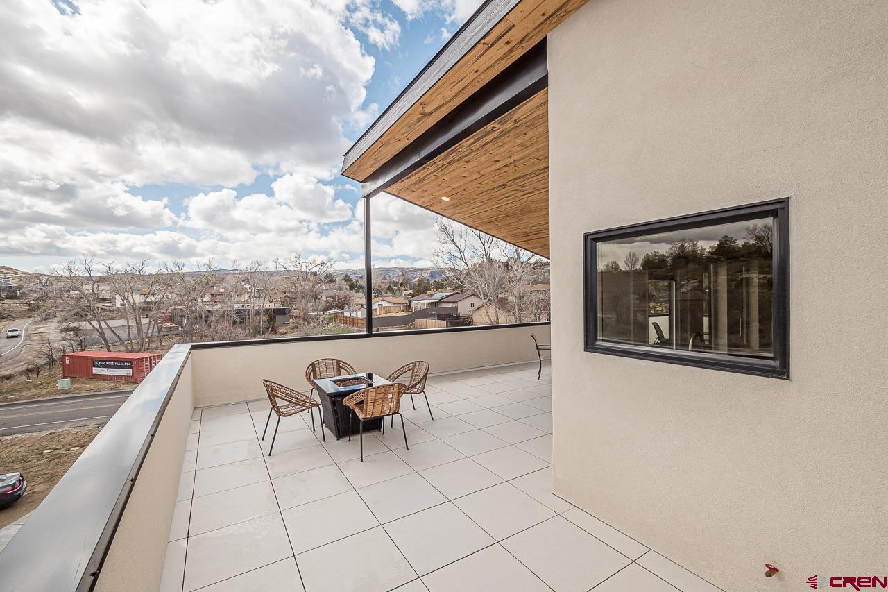 2398 Ridge Cir Drive, Unit B Grand Junction, CO 81507 - Photo 21 of 30 a view of roof deck with furniture