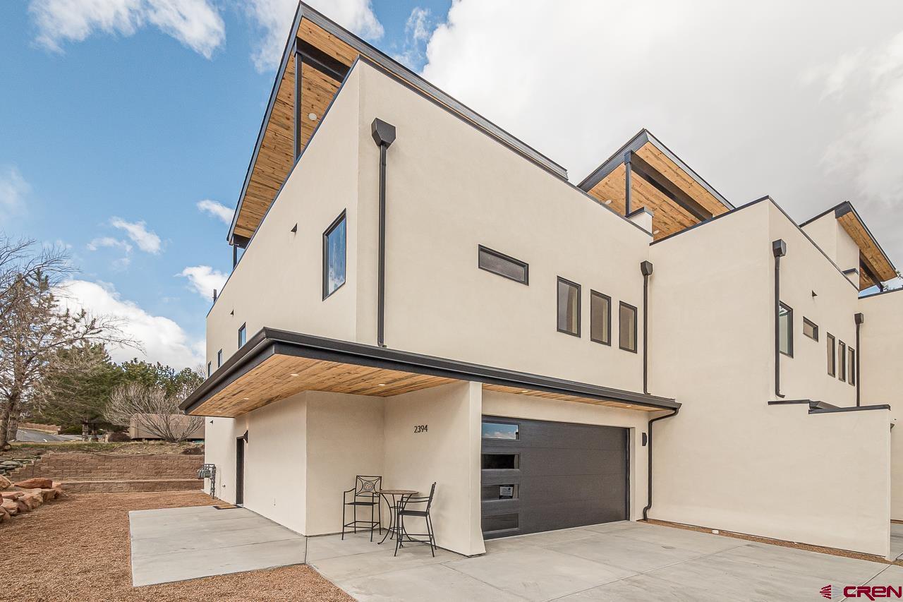 2398 Ridge Cir Drive, Unit B Grand Junction, CO 81507 - Photo 25 of 30 a view of a house with a street