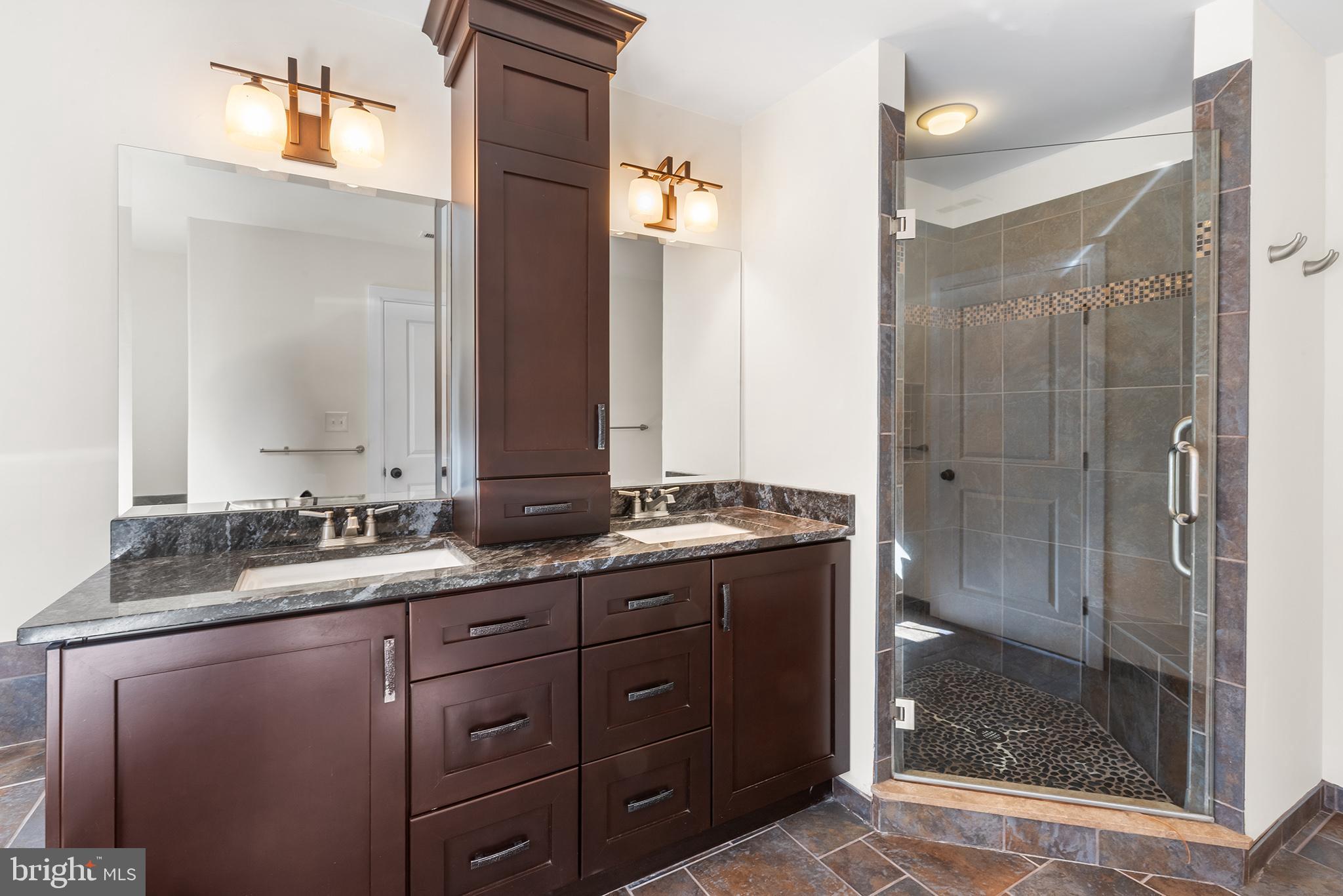 117 Glen Valley Road Yardley, PA 19067 - Photo 19 of 34 a bathroom with a granite countertop sink mirror and double