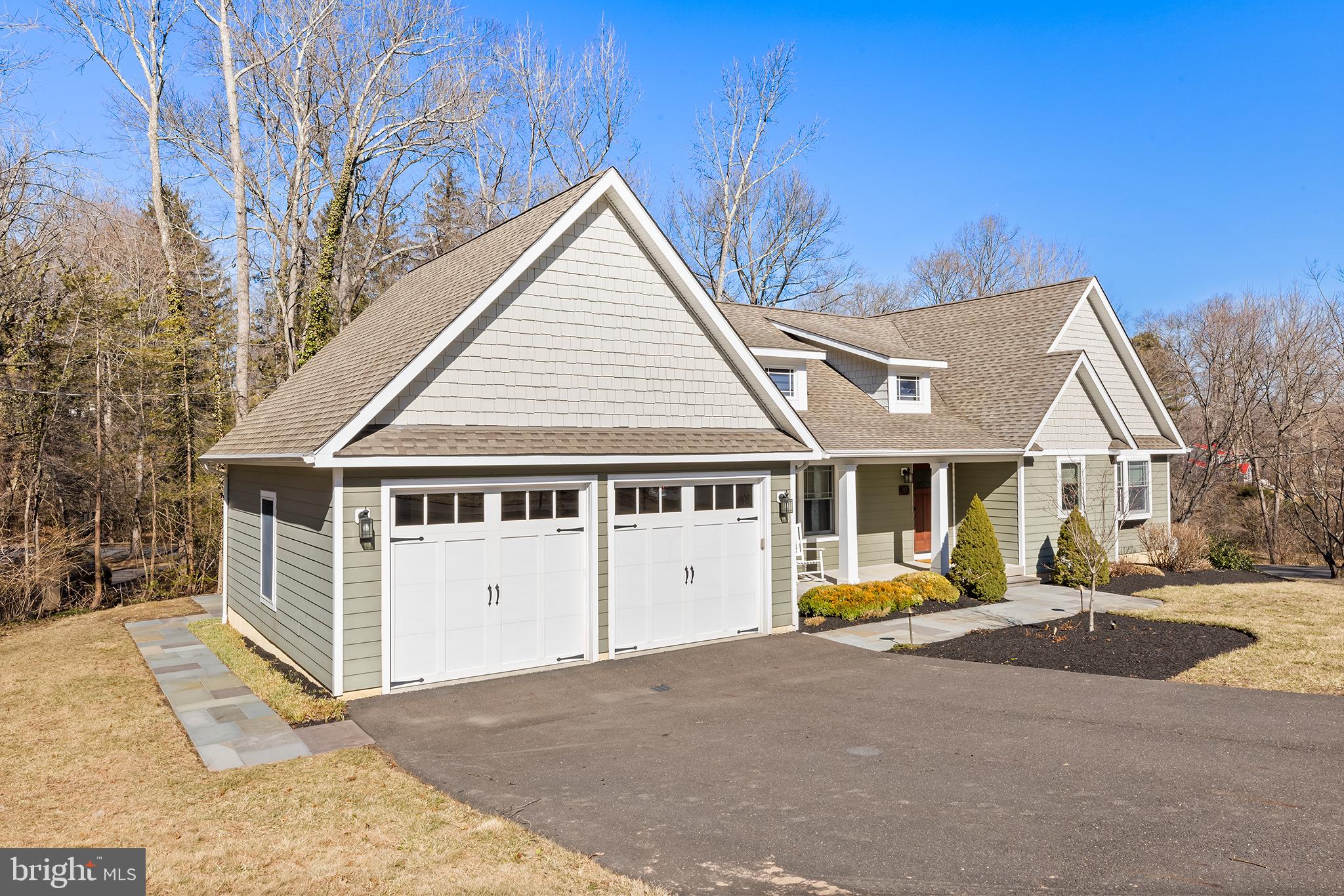 117 Glen Valley Road Yardley, PA 19067 - Photo 2 of 34 a view of a white house with a large trees and yard