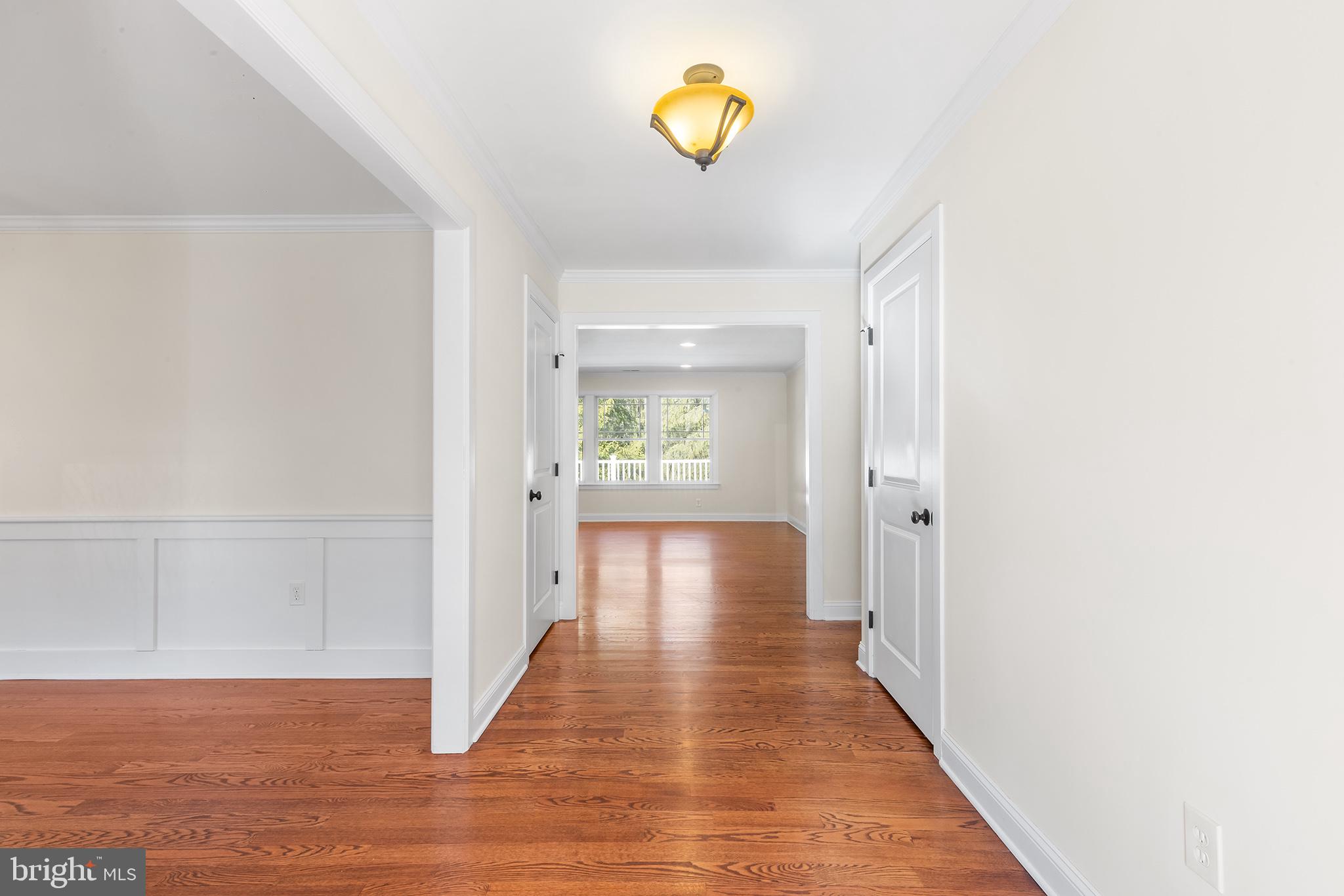 117 Glen Valley Road Yardley, PA 19067 - Photo 3 of 34 a view of a hallway with wooden floor