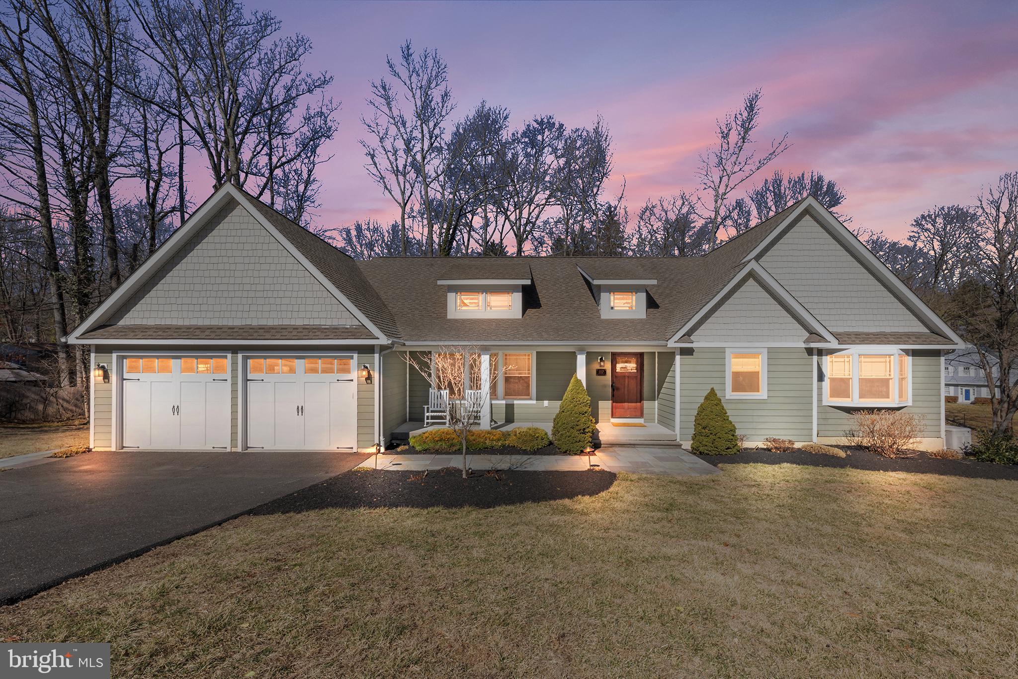 117 Glen Valley Road Yardley, PA 19067 - Photo 33 of 34 a front view of a house with a yard and garage