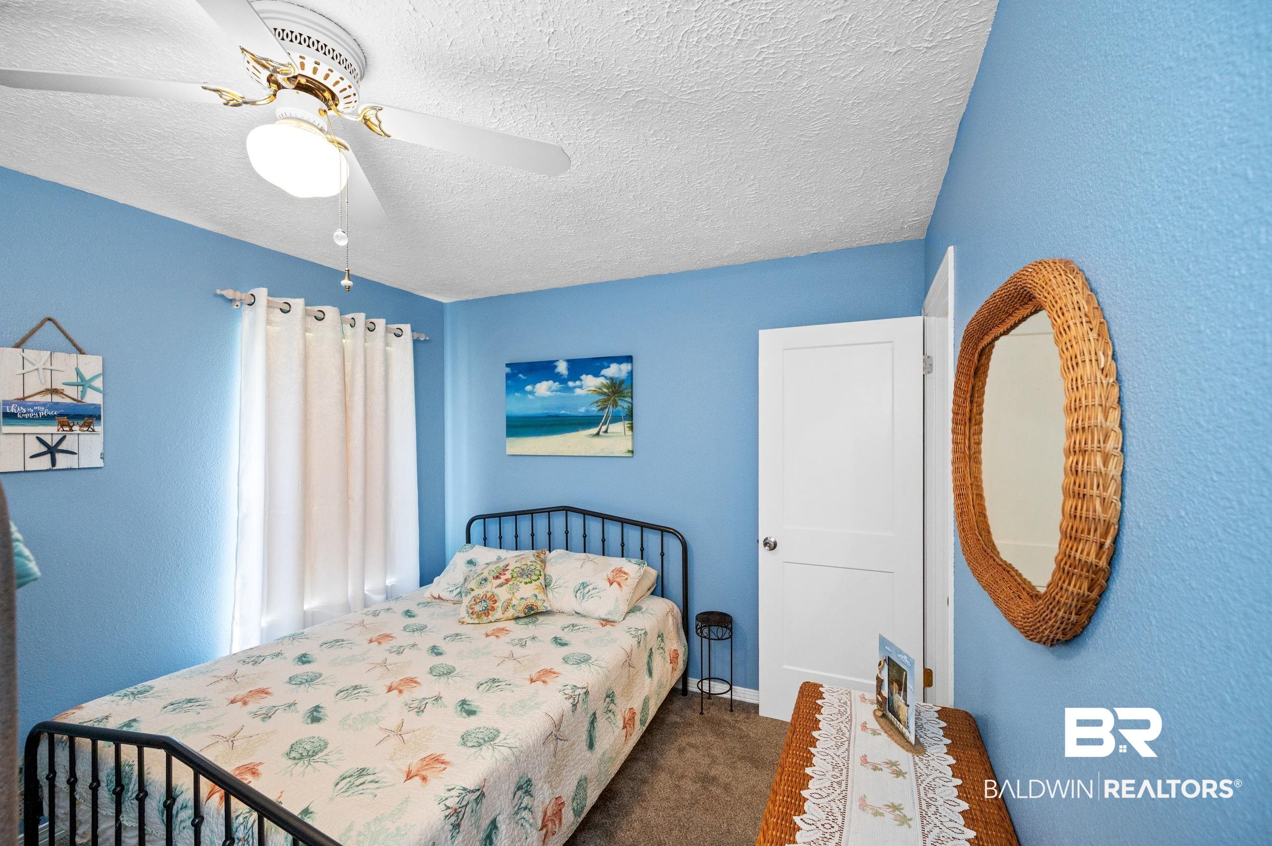 2772 Santa Rosa Circle Lillian, AL 36549 - Photo 20 of 50 Bedroom featuring dark carpet, a textured ceiling, and ceiling fan