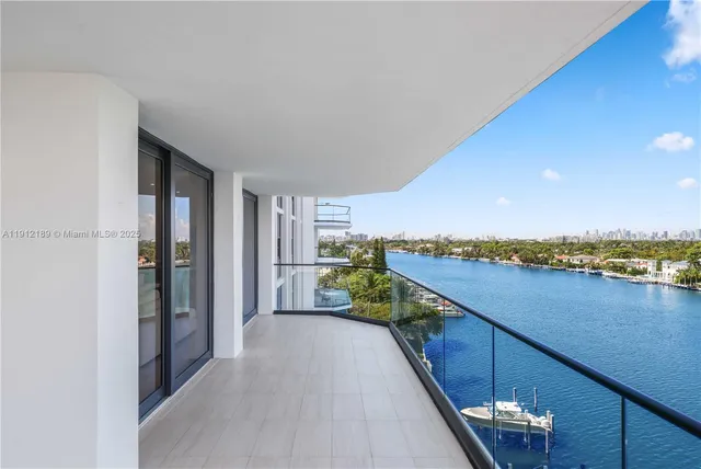 a spacious bedroom with a large bed and a window