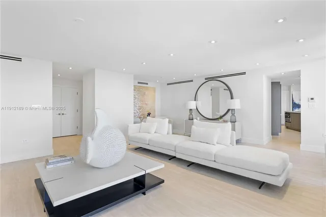 a view of a swimming pool with a yard and sitting space