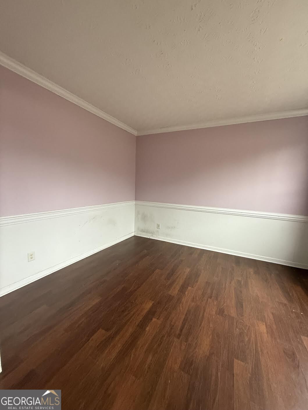 965 Trotters Farm Road Fairburn, GA 30213 - Photo 4 of 6 a view of an empty room with wooden floor