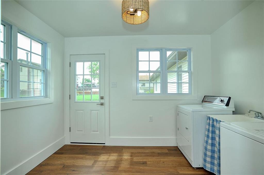 113 3rd Street Houston, PA 15342 - Photo 23 of 27 an empty room with a window and wooden floor