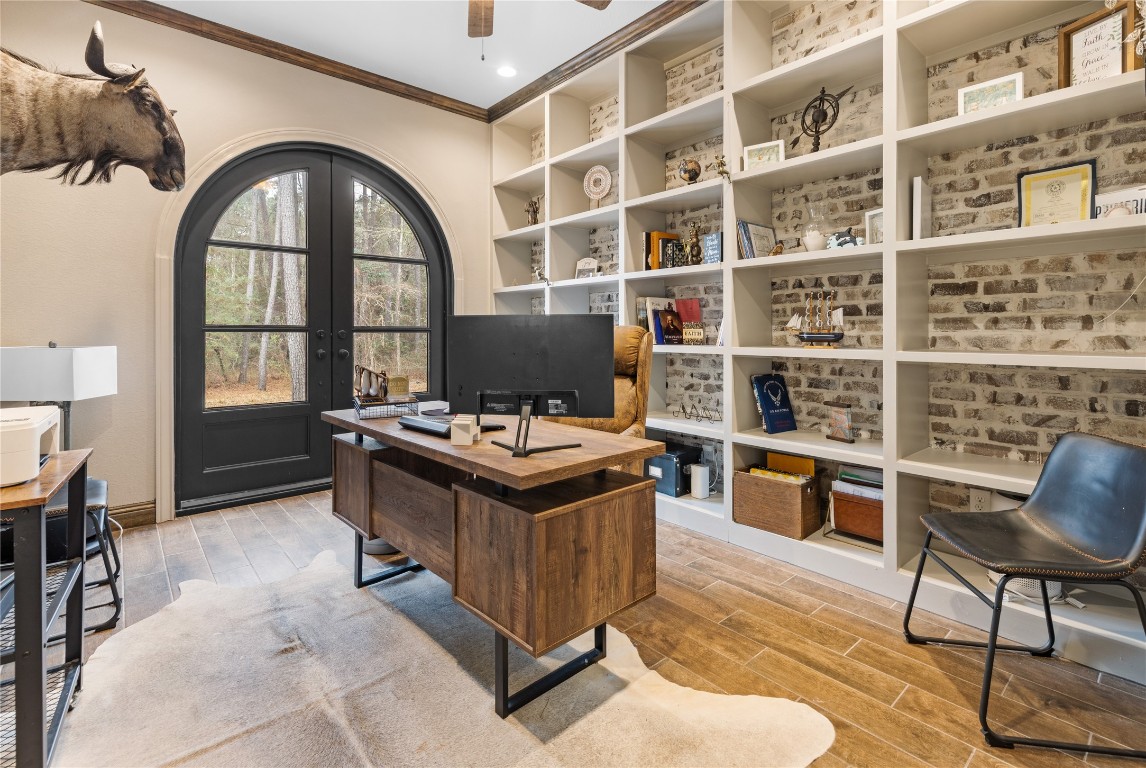 141 Sundog Road Huntsville, TX 77340 - Photo 15 of 49 a living room with a piano and a table