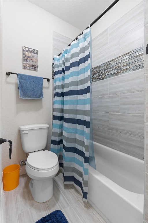 141 Sundog Road Huntsville, TX 77340 - Photo 33 of 49 a bathroom with a toilet and a shower