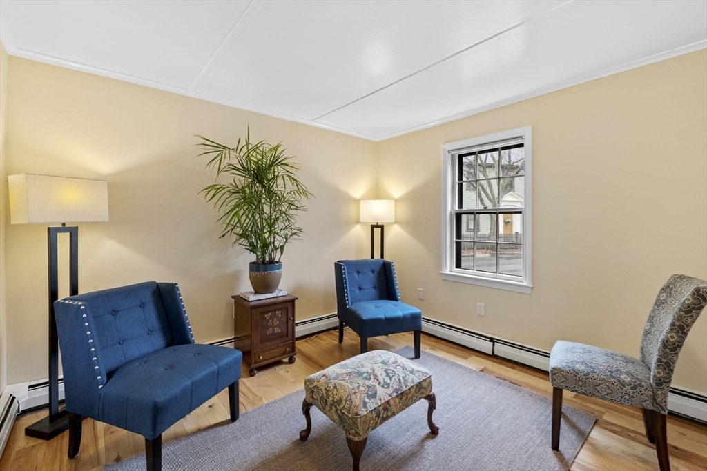 112 Federal Street, Unit 1 Salem, MA 01970 - Photo 15 of 42 a living room with furniture and a potted plant