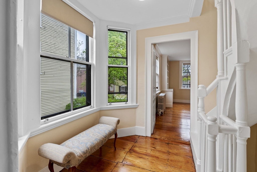112 Federal Street, Unit 1 Salem, MA 01970 - Photo 16 of 42 a living room with furniture and a large window