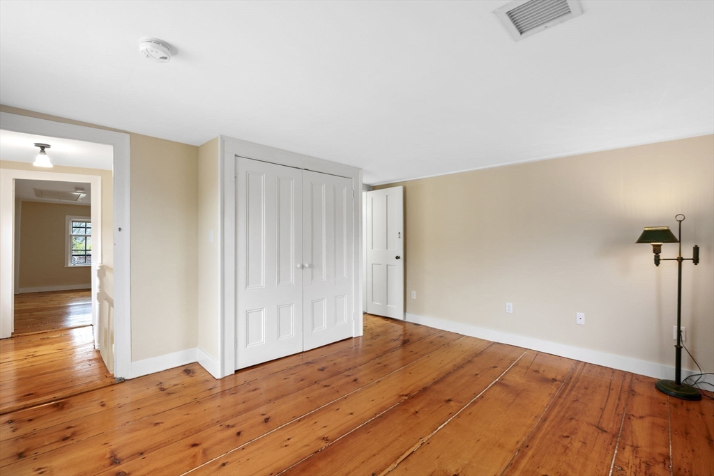 112 Federal Street, Unit 1 Salem, MA 01970 - Photo 36 of 42 a view of empty room with wooden floor