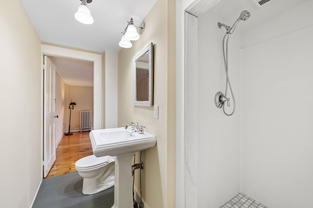 112 Federal Street, Unit 1 Salem, MA 01970 - Photo 37 of 42 a bathroom with a sink toilet and shower