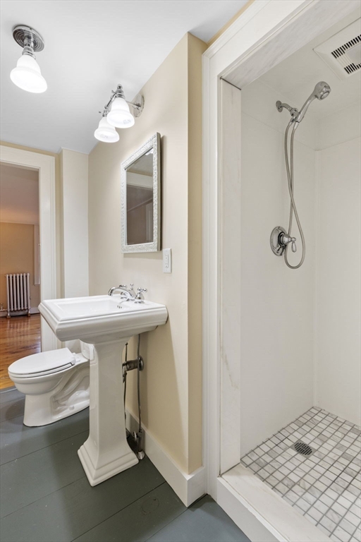 112 Federal Street, Unit 1 Salem, MA 01970 - Photo 38 of 42 a bathroom with a sink mirror and toilet