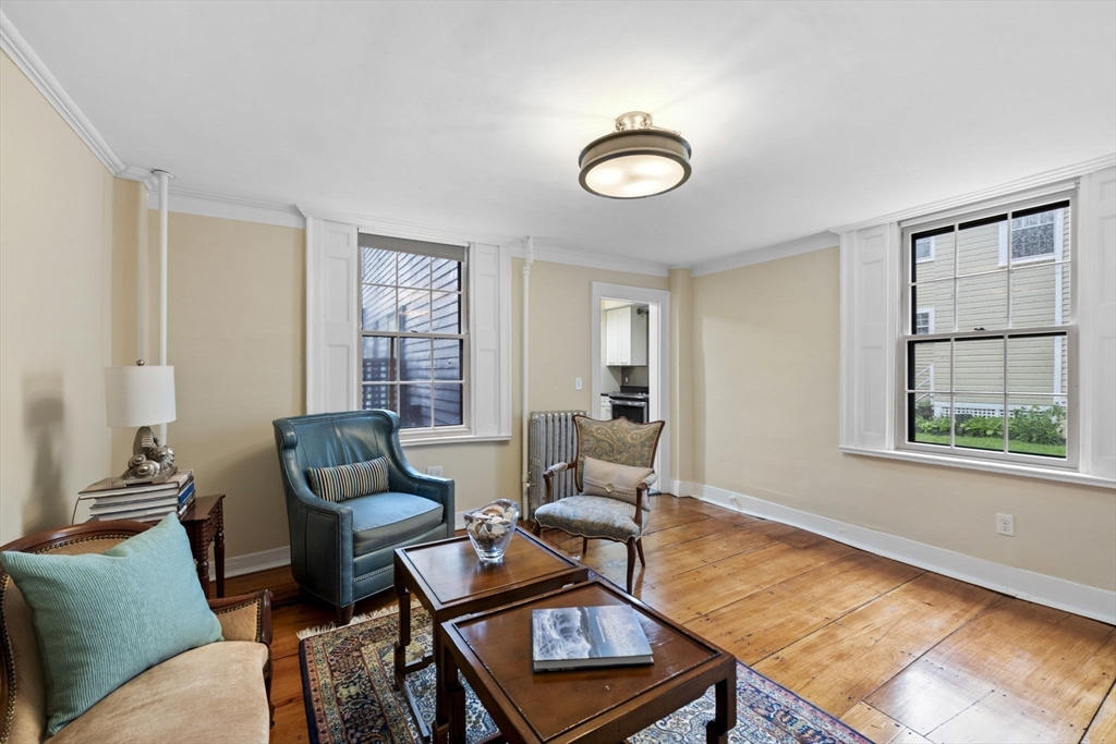 112 Federal Street, Unit 1 Salem, MA 01970 - Photo 4 of 42 a living room with furniture and a window