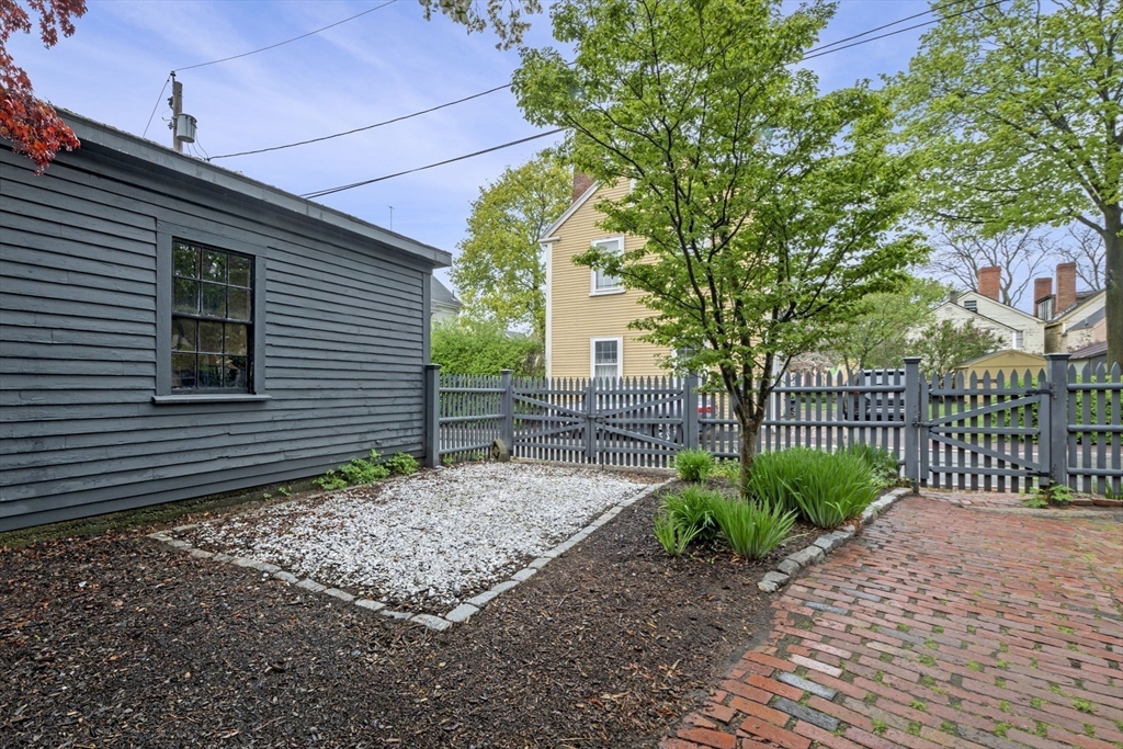 112 Federal Street, Unit 1 Salem, MA 01970 - Photo 42 of 42 a front view of a house with garden