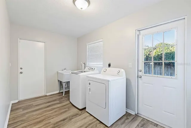 a utility room with dryer and washer