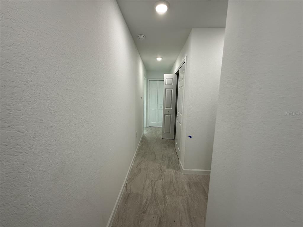 1288 Nackman Road North Port, FL 34288 - Photo 15 of 29 a view of a hallway