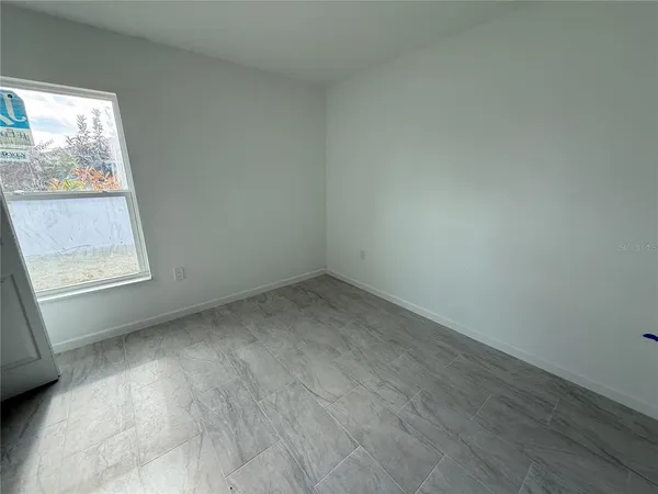 an empty room with a window