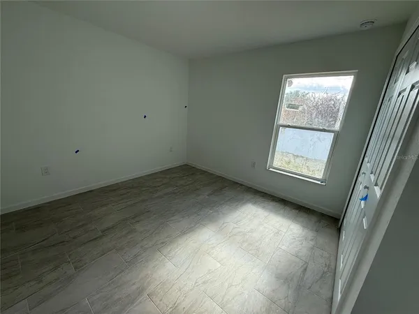 an empty room with windows