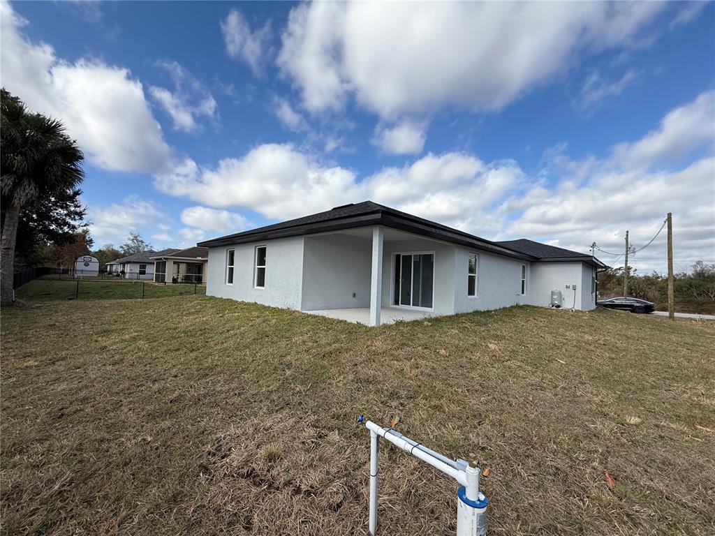 1288 Nackman Road North Port, FL 34288 - Photo 25 of 29 a house view with backyard space