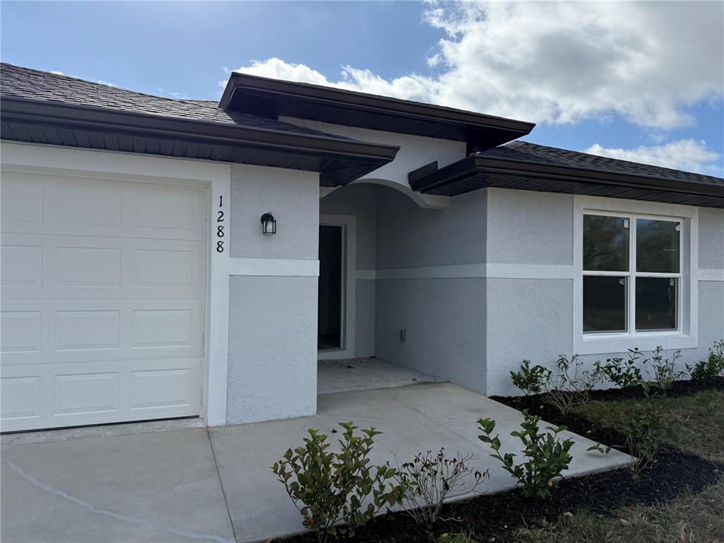 1288 Nackman Road North Port, FL 34288 - Photo 3 of 29 a front view of a house